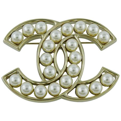 chanel brooch pearl and chain|Chanel brooch buy online.